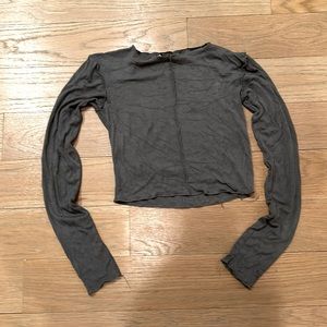 Dark grey long sleeve shirt.